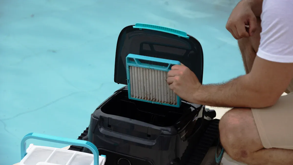 A person removes a dirty filter cartridge from an Aiper robotic pool cleaner next to a swimming pool.